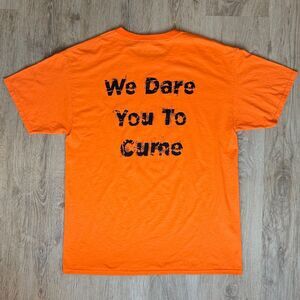 Deja Vu Showgirls “We Dare You To Cume” Double-Sided Tee – L